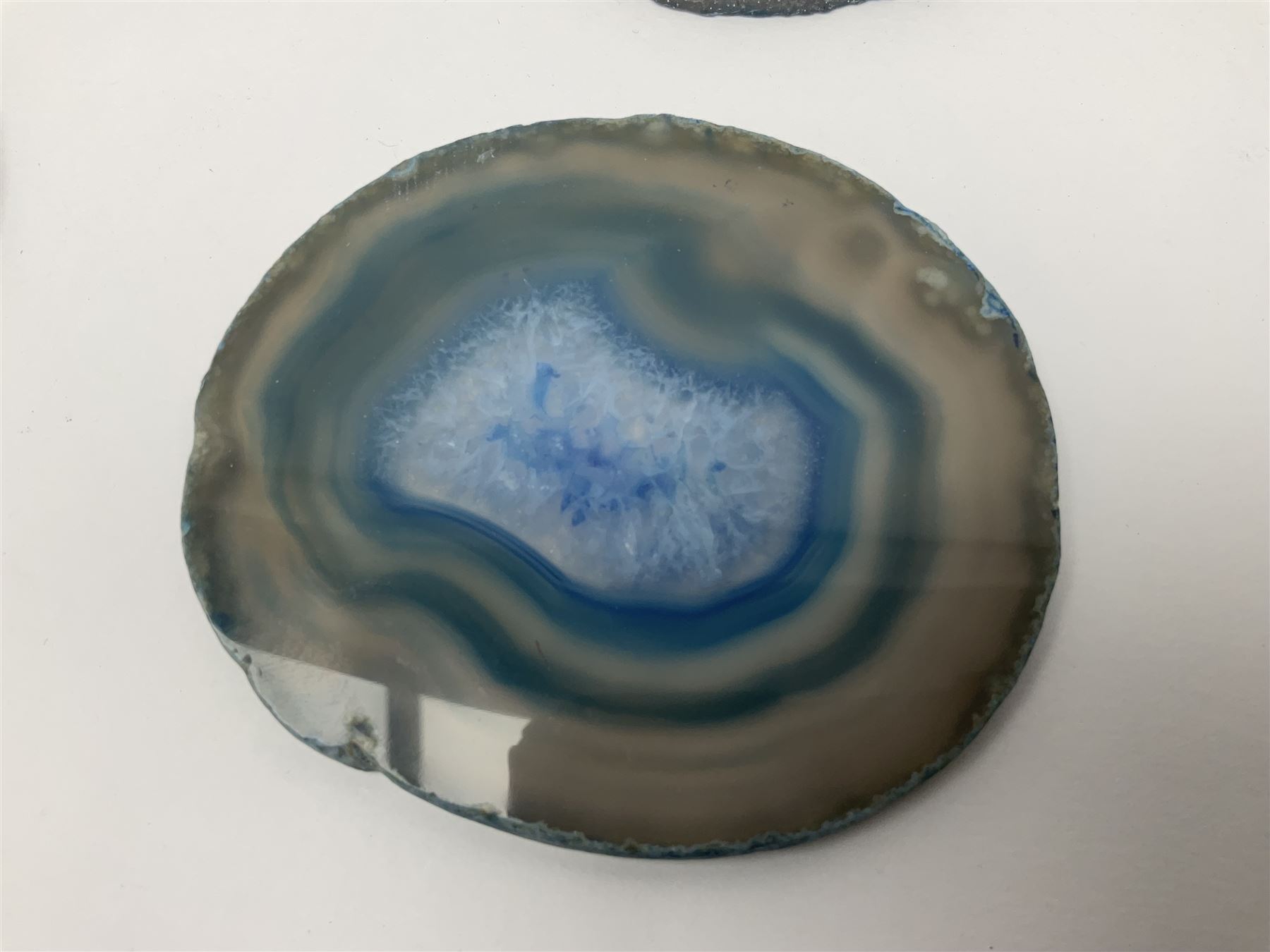 Five blue agate slices, polished with rough edges, H9cm, L7cm