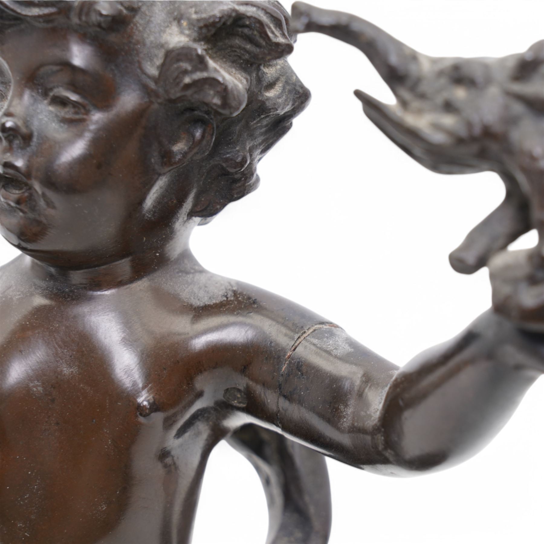 After Rousseau - Pair of bronze figures of cherubs, one holding a toy elephant, the other originally with an artists board on marble bases H23cm