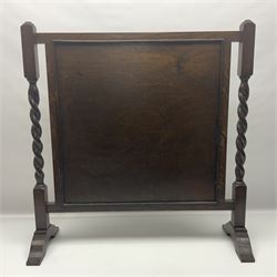 Tapestry fire screen depicting a landscape, with barley twist legs, H72cm