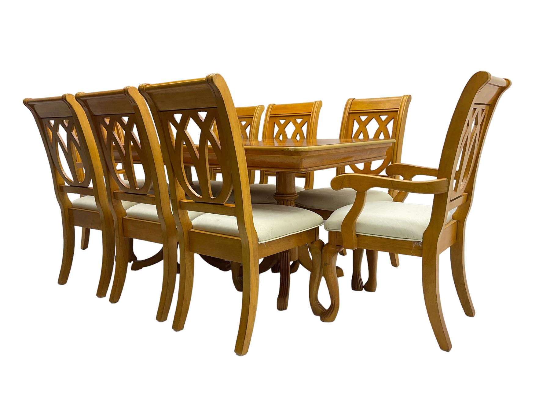 Yew wood extending twin pedestal dining table, rectangular top with ebony stringing over turned and reeded vasiform pedestals on tripod bases, with two additional leaves (W159cm D92cm); and set of eight (6+2) matching dining chairs, high pierced backs over seats upholstered in ivory fabric, on cabriole supports (W57cm H101cm)