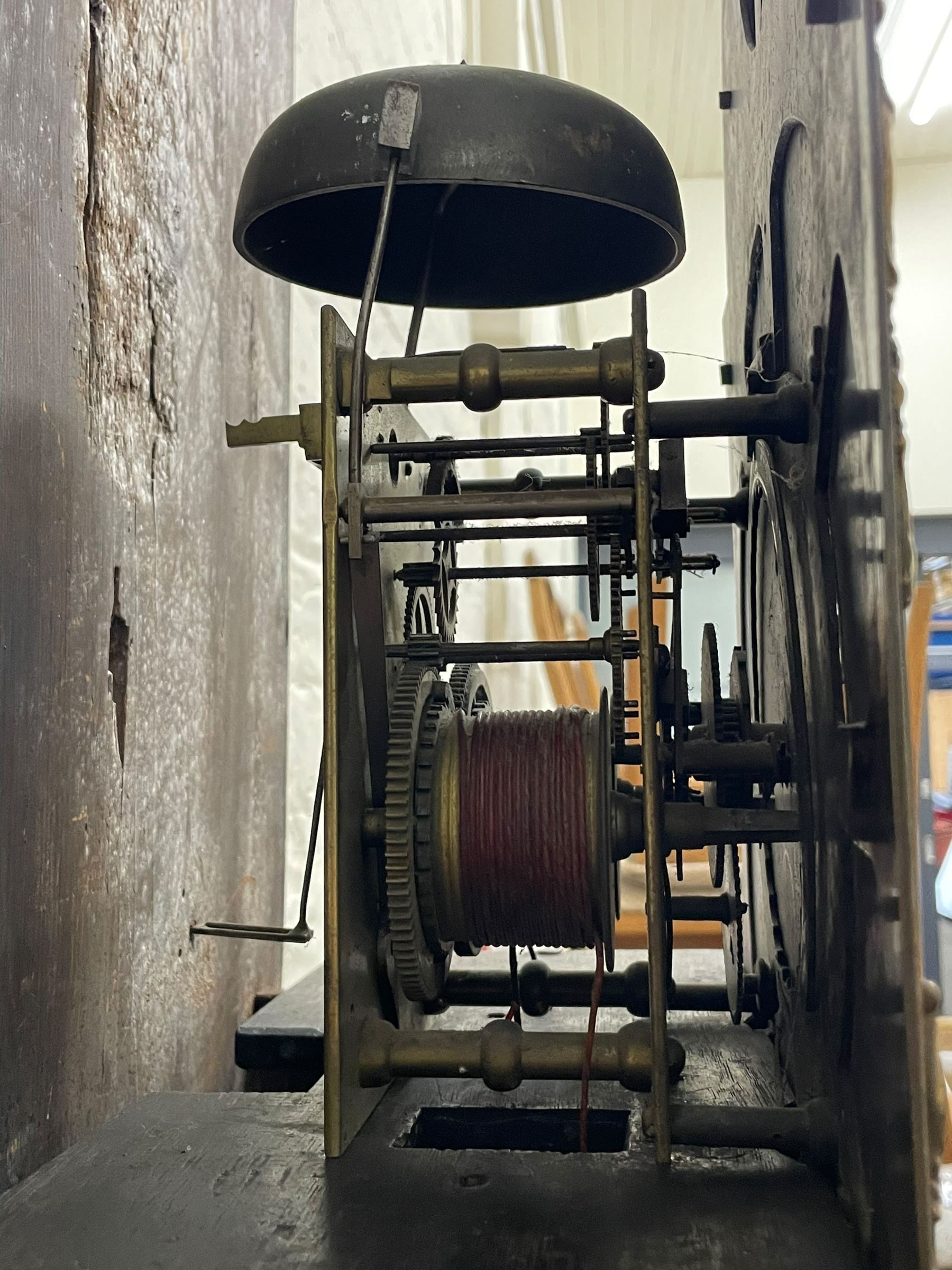 Gilbert Kidd of Malton (North Yorkshire) - late 18th century oak 8-day longcase clock c1780,  with a tall double caddy top and later brass ball and spire finials, break arch hood door beneath with attached pilasters and wooden capitals,  plain trunk with a long flat topped door, raised on a square plinth with applied skirting,  brass break arch dial with the makers name to the silvered boss in the break arch, engraved and silvered dial centre and chapter ring, with cast spandrels and matching steel hands, subsidiary seconds dial and square calendar aperture, dial pinned directly to a rack striking movement with a recoil anchor escapement, sounding the hours on a cast bell. With pendulum and weights.
The Kidd family were a prolific family of provincial clockmakers working in Malton from the mid 18th century until the early 19th century. Many of their clocks are simply signed 