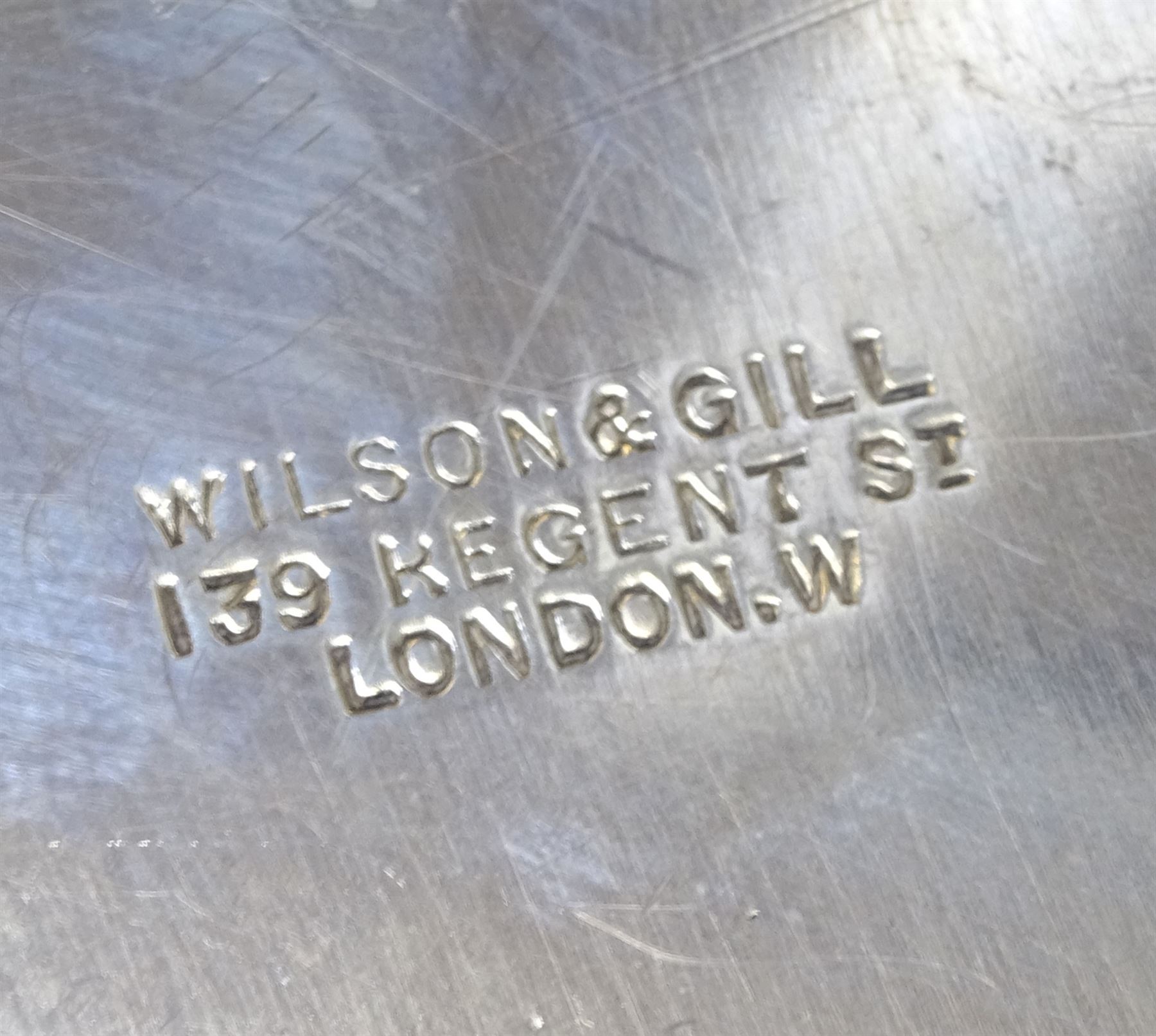 Raich Carter - presentation hallmarked silver two-handled tray of rounded oblong form with gadrooned rim by Wilson & Gill, 139 Regent Street, London, inscribed to the centre 'Presented to Mr. & Mrs. Raich Carter by the Lord Mayor of the City and County of Kingston-upon-Hull Alderman R.E. Smith J.P. on May 30th 1952on behalf of the many Admirers who subscribed to The Lord Mayor's Testimonial Fund in recognition of Raich Carter's genius as a footballer and his services to the City', London 1937 82oz L61cm; together with a hallmarked silver four-piece tea and coffee set by Cooper Bros. & Sons Ltd, the teapot of London shape with ebonised handle and knop, each piece engraved with an initial 'C', Sheffield 1920  60.5oz, teapot L29.5cm