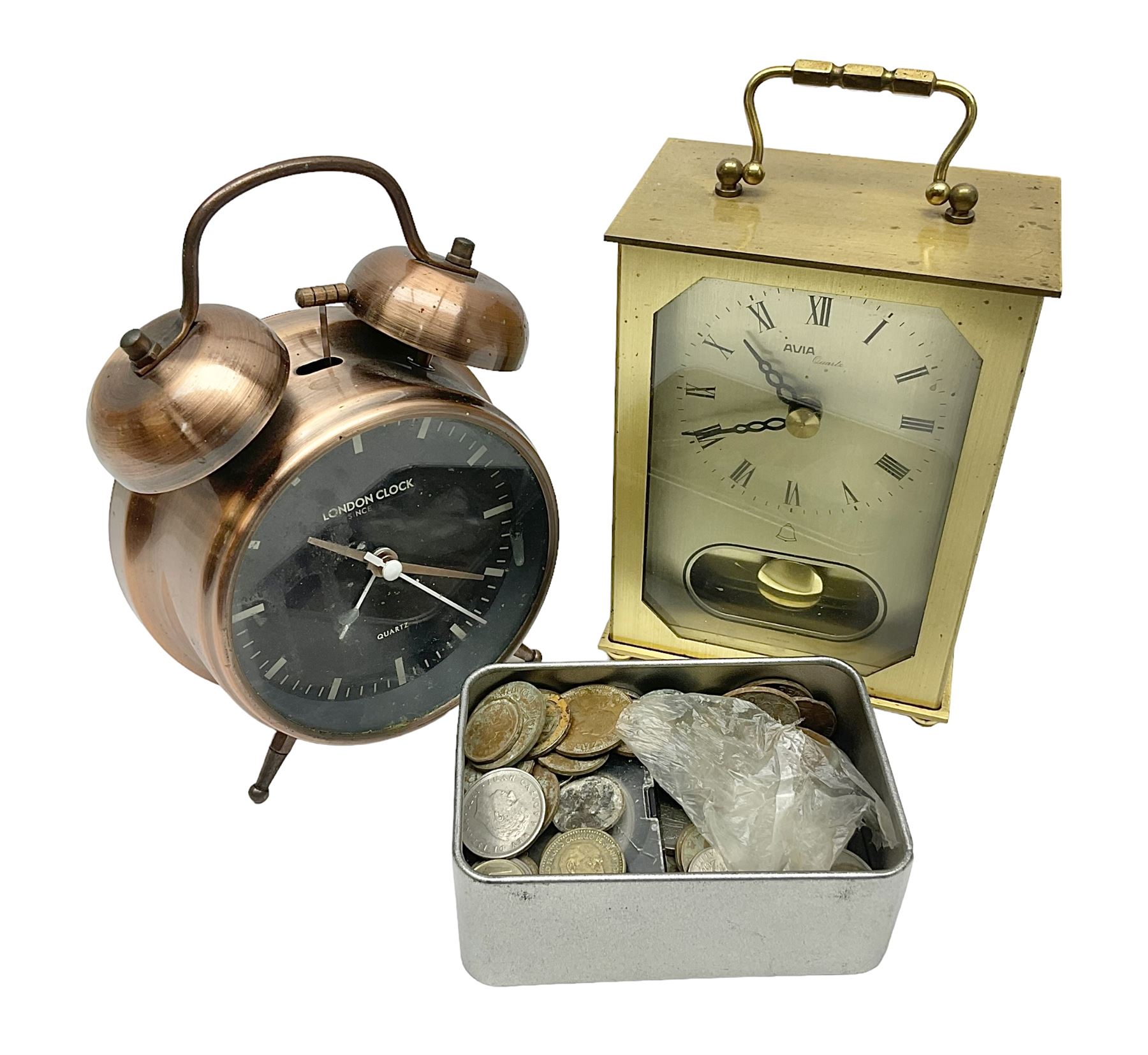 Avia Quartz mantle clock, a London alarm clock and a collection of coins