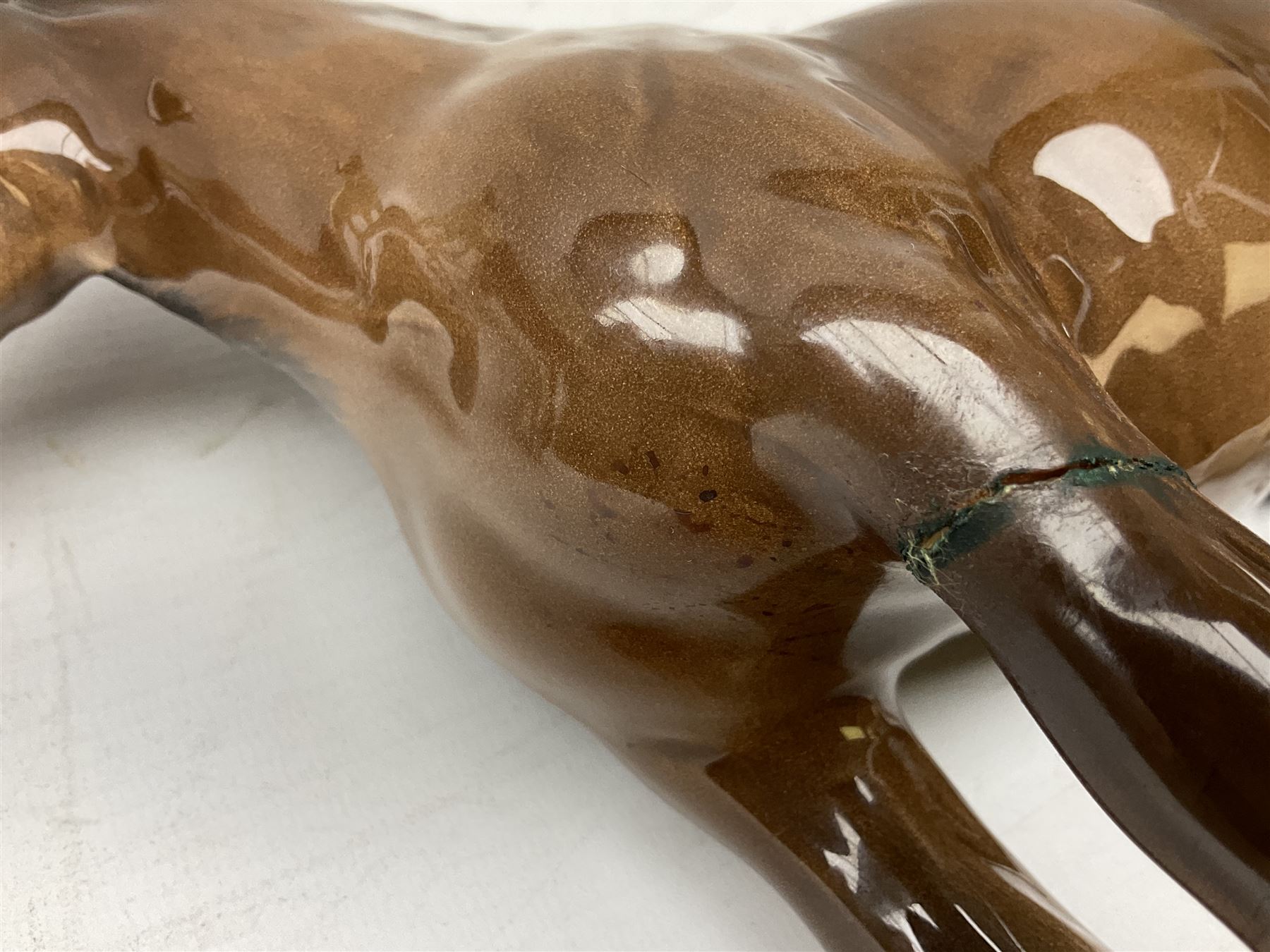 Three Beswick models comprising Hereford Bull no 949, 'CH Cutmil Cupie' Pug, and bay Shire horse, all with printed marks beneath