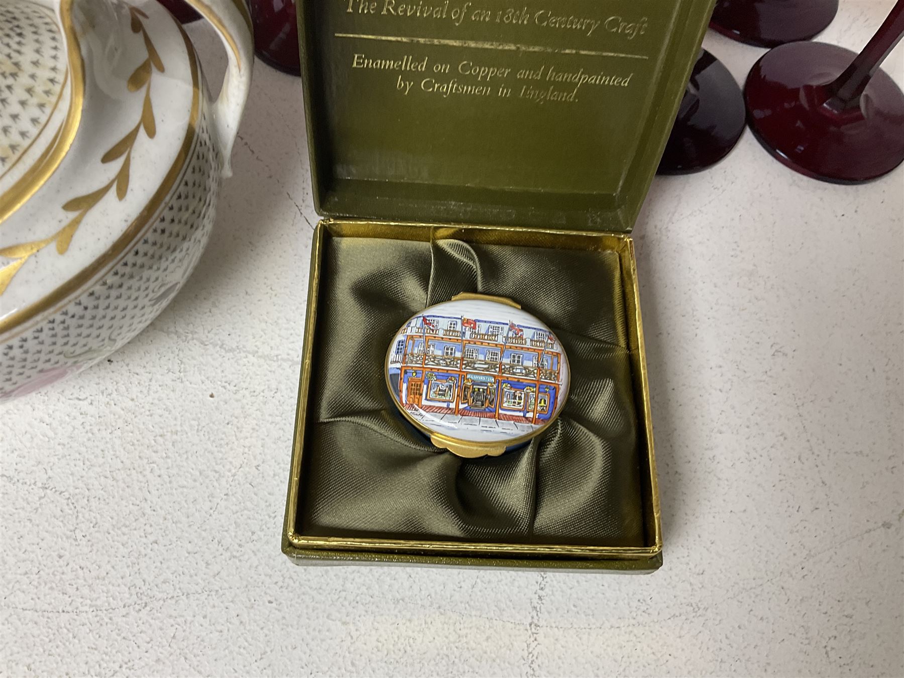 Twin handled sucrier with cover, in the manner of Thomas Grainger for Royal Worcester, together with Wedgwood Medina pattern coffee cans and saucers, a set of ten ruby glasses and a Wedgwood cameo glass tankard etc