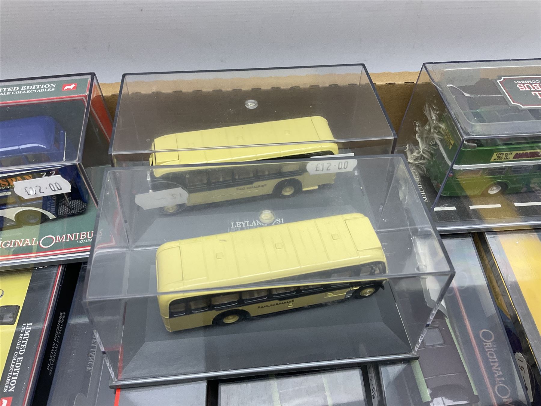 Corgi The Original Omnibus Company/Bus Operators in Britain - seventeen die-cast models of buses and coaches, predominantly limited edition; all in perspex display cases (17)