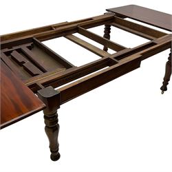 19th century mahogany extending dining table with three additional leaves, rectangular top with rounded corners, pull-out action, on turned and faceted supports with brass castors