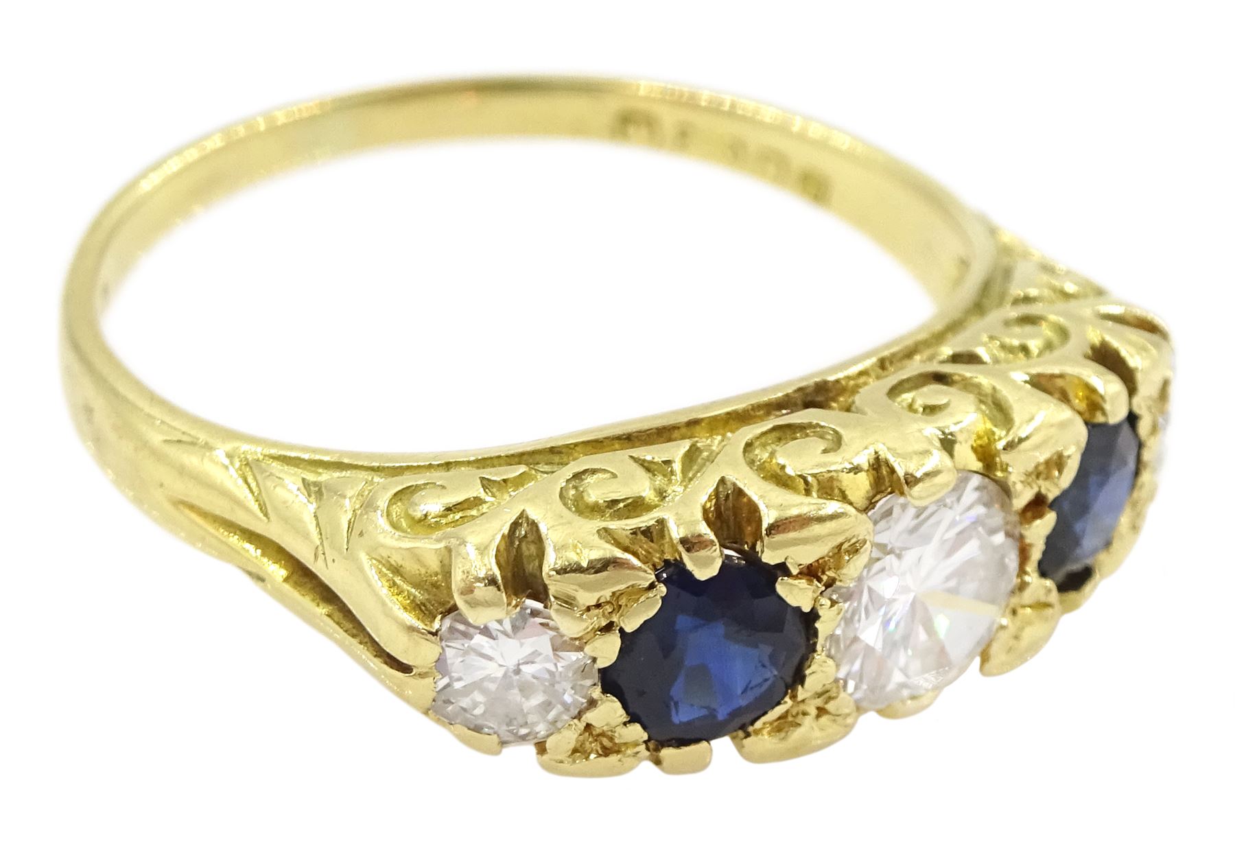 18ct gold five stone round brilliant cut diamond and sapphire ring, London 1975, total diamond weight approx 0.60 carat