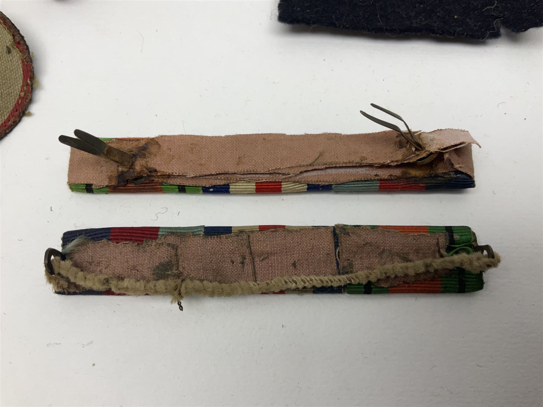 WW1 Short & Mason Ltd 'The Magnapole' black japanned brass field compass in leather carrying case; WW1 trench art paper knife inscribed Dixmude; and small quantity of cloth badges etc