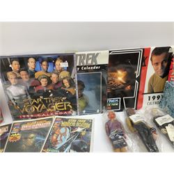 Quantity of Star Trek memorabilia and promotional merchandise including action figures, calendars, mobile kit, collector's fact cards, models etc; many in original packaging