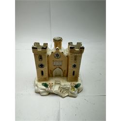 Pair of Staffordshire figures modelled as chained Dalmatians seated upon cobalt blue oval bases, H13cm, together with a Staffordshire pastille burner modelled as a castle, H12cm, a pair of 19th century Derby potpourri pots (lacking covers), and an 18th century blue and white tea bowl 