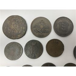 Thirty six late 18th century and onwards United Kingdom and World coins and tokens, to include 1772 Catherine II 5 Kopecks, Swedish quarter and half Skilling pieces dated 1809 and 1806, two Skilling Courant piece dated 1810, 1831 Isle of Man half penny token etc 