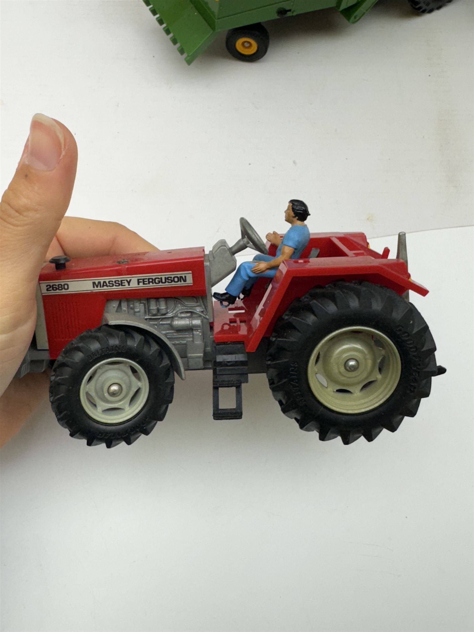 Collection of predominantly late 1970s/early 1980s Britains diecast vehicles and farming equipment, including Corn King, tractors, JCBs, horsebox, skip lorry, etc together with figures and accessories