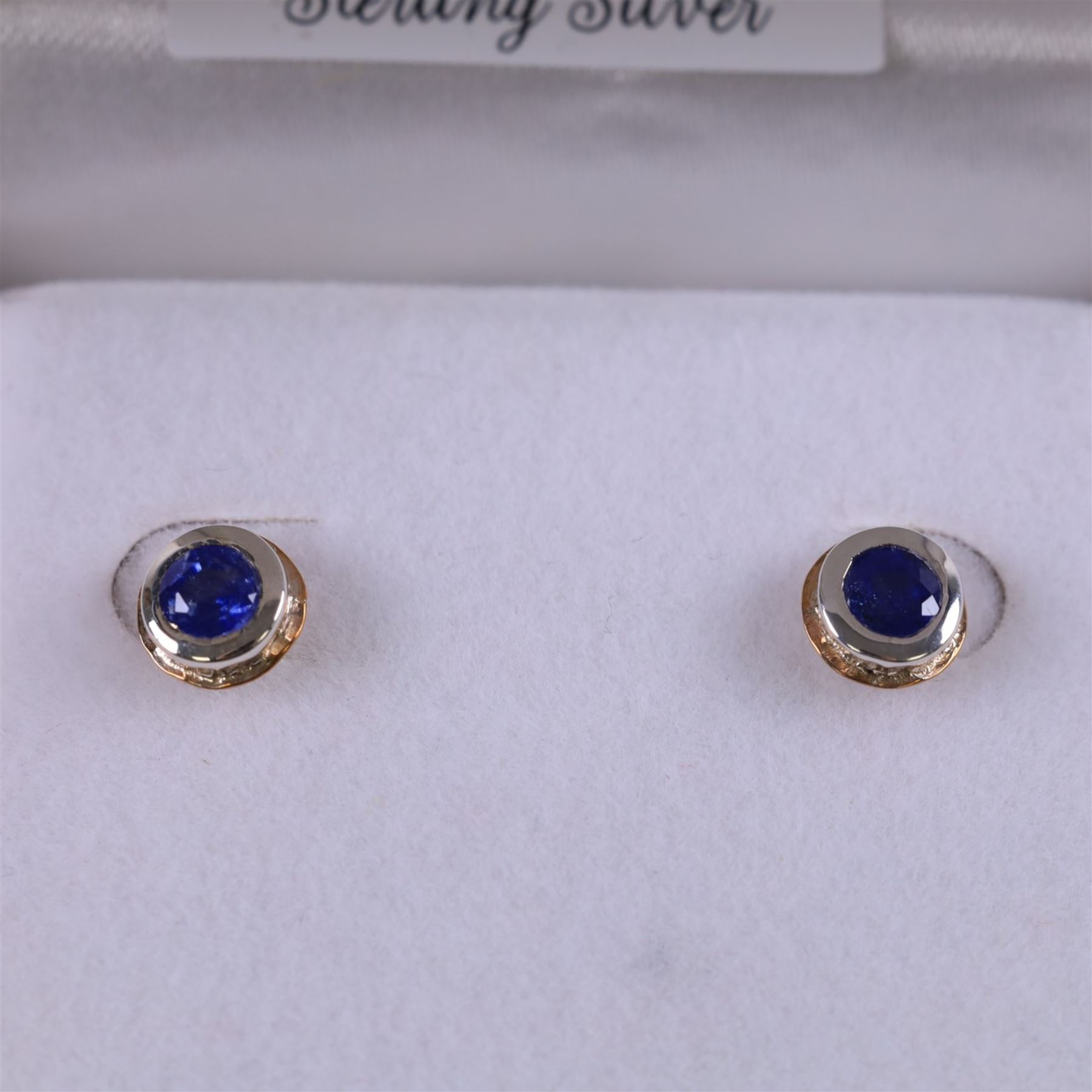 Silver and 14ct gold sapphire stud earrings, boxed