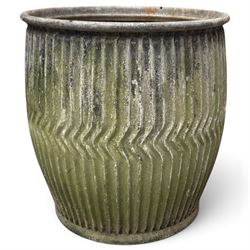 Two20th century galvanised metal dolly tubs, with rolled rims above corrugated bodies centred by chevron bands and circular bases, max W48cm H52cm)