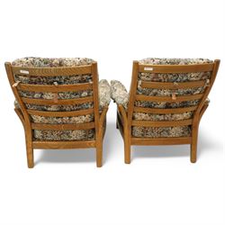 Lucian Ercolani for Ercol - pair of model '903' elm armchairs, with loose cushions upholstered in floral pattern fabric