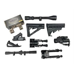 Assorted shooting accessories including two telescopic sights, red dot sight,  two bi-pods, spirit level mount, two gun butts and two forward handles