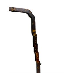 Early 20th century wall hanging tortoise shell framed mirror, of rectangular form, the upper half of the frame shaped and stepped surrounding a plain mirror plate