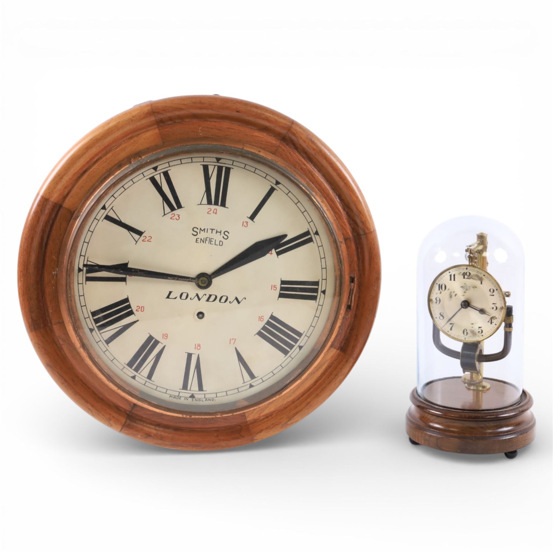 Bulle electric battery clock on a turned wooden base under dome, together with Smiths London circular wall clock