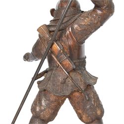 Japanese bronze of a Samurai, possibly Meiji period, standing holding spear, on a wave form base, H72cm
