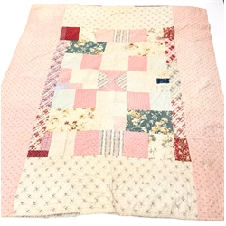  Victorian patchwork quilt, using printed cottons in pinks, purples, reds, creams and other colours with a striped reverse, 206cm x 190cm approx  