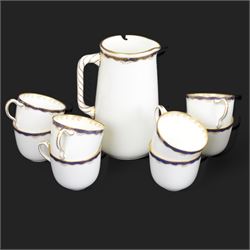 Wedgwood tea service, comprising teapot and stand, hot water jug, milk jug, open sucrier, twelve side plates, two sandwich plates, twelve cups and eleven saucers 