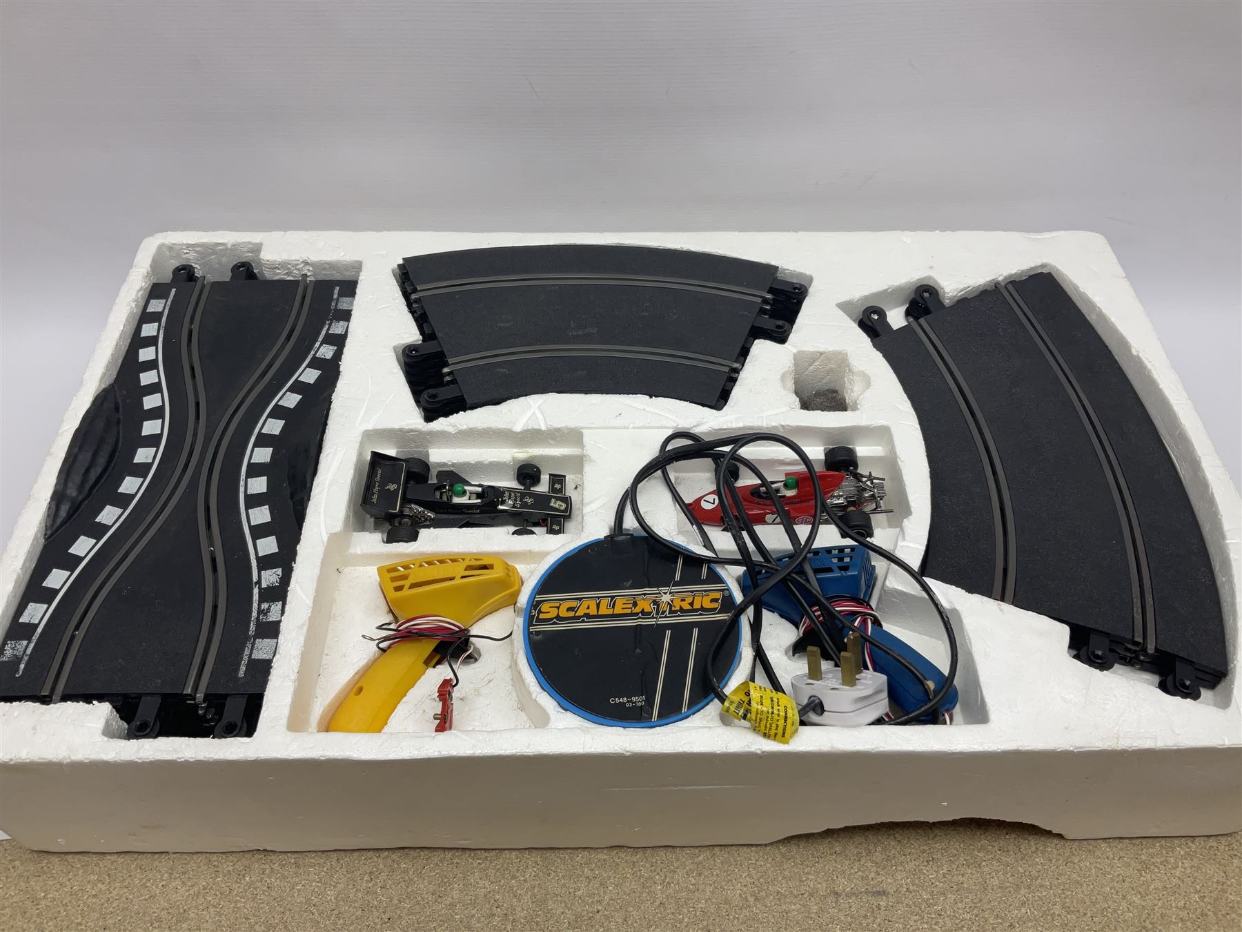 Scalextric - Scalextric 400 C587 set with March Ford 721 and JPS Formula One cars; Calibra Cup set with Motorsport Calibra and Old Spice Calibra; C8040 Track Extension Pack, Hump Back Bridge part-set and unassociated SuperSlot 1:32 scale die-cast Williams-Toyota FW29 unassembled car in four blister packs 