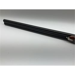 Gunmark Silver Sabel De Luxe 12-bore side by side double barrel side lock ejector sporting gun, 68.5cm barrels with 2.75cm chambers and matt bluing, walnut stock with chequered grip and fore-end and thumb safety, serial nos.12509 & 100.085, L111.5cm overall SHOTGUN CERTIFICATE REQUIRED