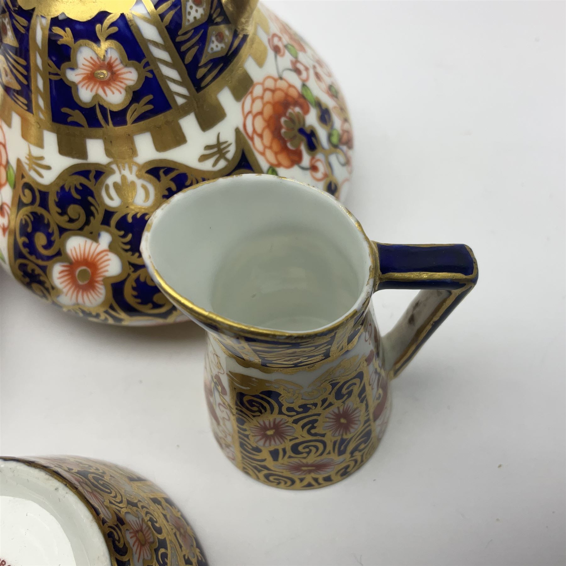 Pair of Royal Crown Derby 6299 imari pattern miniature vases