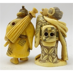  Two Japanese carved ivory Netsukes, both playing musical instruments, signed, H5cm max (2) Provenance: private collection   