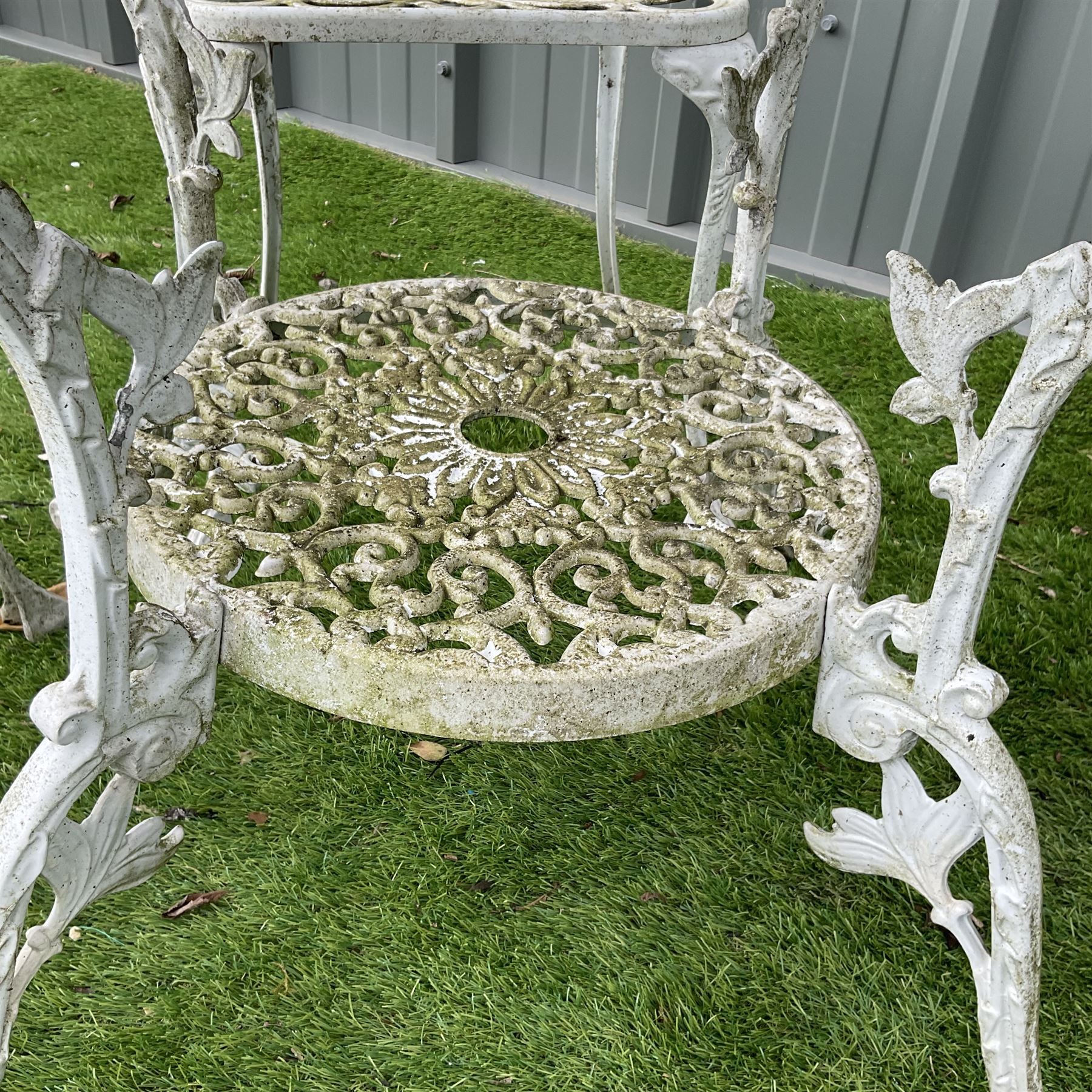 Cast aluminium circular garden table and four chairs - THIS LOT IS TO BE COLLECTED BY APPOINTMENT FROM DUGGLEBY STORAGE, GREAT HILL, EASTFIELD, SCARBOROUGH, YO11 3TX
