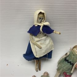 Twelve miniature bisque, bisque headed and wooden dolls to include articulated examples, tallest 12cm 
