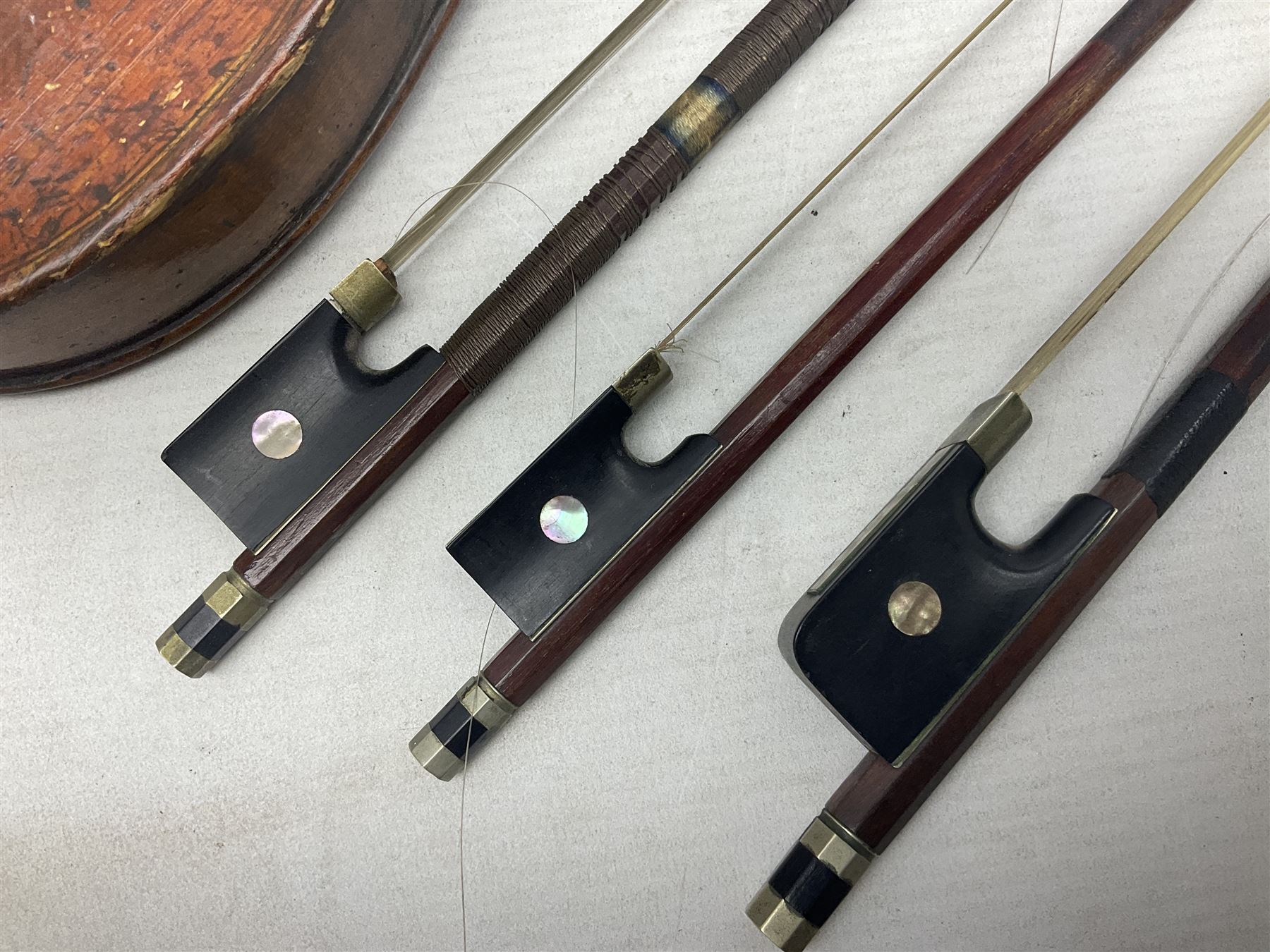 Incomplete amateur made violin c1880 for restoration and completion with 36.5cm one-piece maple back and ribs and spruce top L59.5cm; together with two brazilwood violin bows and pernambuco cello bow, all with nickel mounts (4)