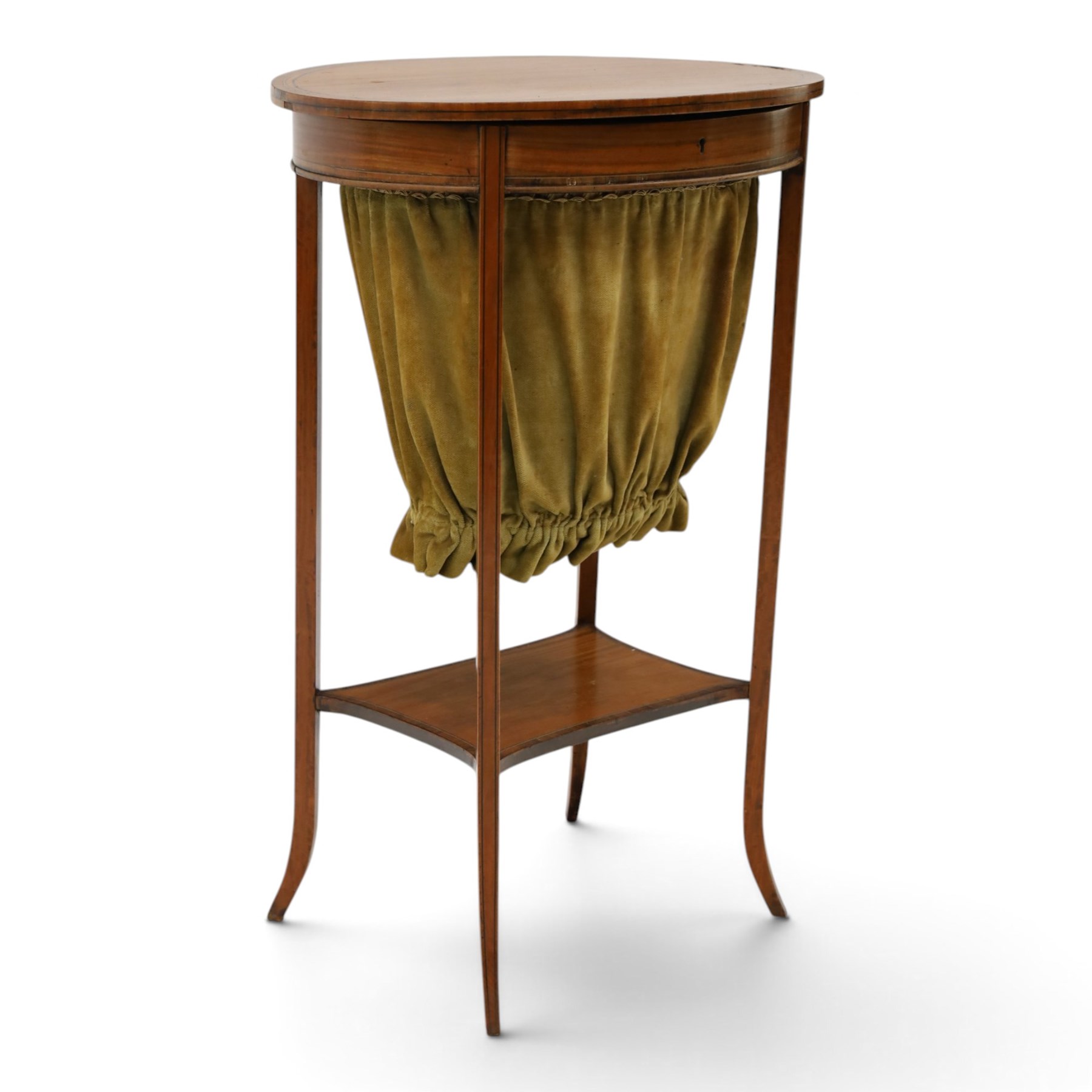 Edwardian inlaid satinwood oval sewing or work table, crossbanded and ebony-strung hinged top enclosing fitted compartment and olive-green upholstered well, raised on square tapering splayed supports united by under-tier 