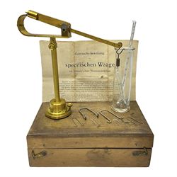 Reimann's Specific Gravity Balance, complete with stand, adjustable platform, thermometer, glass float and chamber, in fitted wooden case