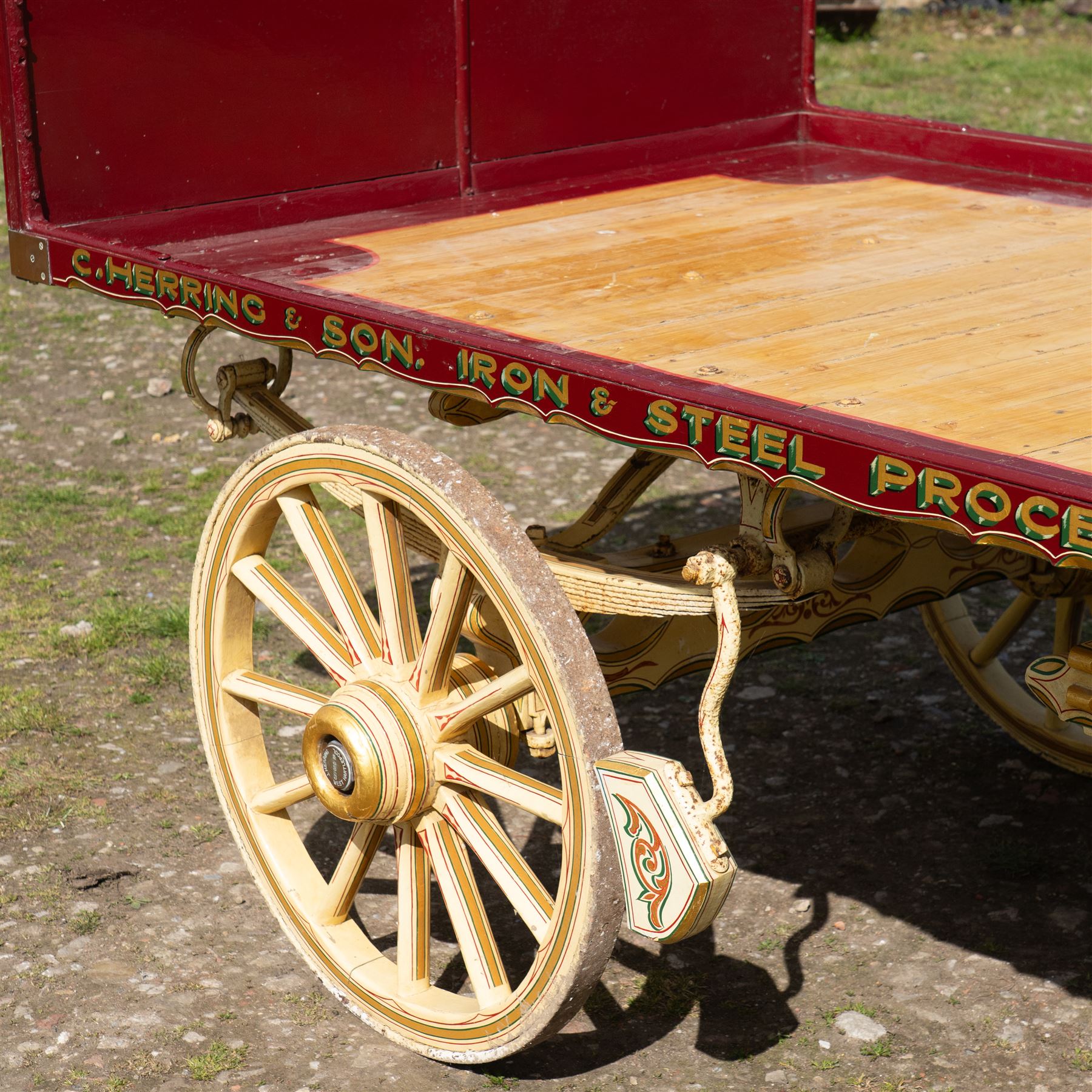 Advertising Trade Dray Wagon for C. Herring & Son, Hartlepool, Dated 1895 and Renovated 1975

An exceptionally decorative late Victorian horse drawn advertising trade dray, built by J. Herring of Hartlepool in 1895 and later renovated by C. Herring in 1975, as recorded by the painted inscription beneath the body. Finished in a striking cream and maroon livery with extensive hand painted signwriting, the wagon carries the name C. Herring & Son, Iron & Steel Processors, Hartlepool along its sides and rear panels. The wagon is fitted with a flat timber loading bed, twin shafts for a single horse, elegant spoked wooden wheels, iron bound tyres, rear headboard and traditional undercarriage with leaf spring suspension. Richly detailed scrollwork and lining throughout make this a particularly attractive example, suitable for collection, display, museum, promotional or coaching purposes.

Features

• Built by J. Herring, Hartlepool, 1895
• Renovated by C. Herring in 1975
• Original style hand painted advertising signwriting
• Flat timber loading platform
• Raised rear headboard with decorative pierced gallery
• Twin shafts for a single horse
• Wooden spoked wheels with iron tyres
• Traditional leaf spring suspension
• Extensive decorative lining and scrollwork throughout
• Attractive cream and maroon colour scheme
• Suitable for private collection, museum or display use

Dimensions:
Overall length: 560 cm
Body length: 300 cm
Width: 158 cm
Height: 150 cm

Wheel Diameters:
Front wheels: 76 cm
Rear wheels: 86 cm