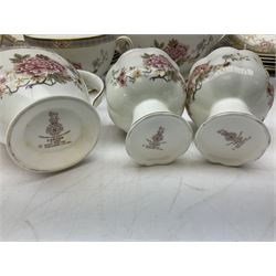 Royal Doulton Canton pattern tea and dinner wares comprising teapot, milk jug, twin handled lidded sucrier, cake plate, six dinner plates, six side plates, five smaller plates, five saucers and pair of candlestick holders, together with Sevres clear glass decanter with faceted sides and stopper, all with marks beneath