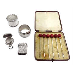 Victorian silver sovereign case by Deakin & Francis Ltd, Birmingham 1892, silver 'cherry' cocktail sticks by Adie Brothers Ltd, Birmingham 1929, two silver napkin rings and a silver vesta case hallmarked