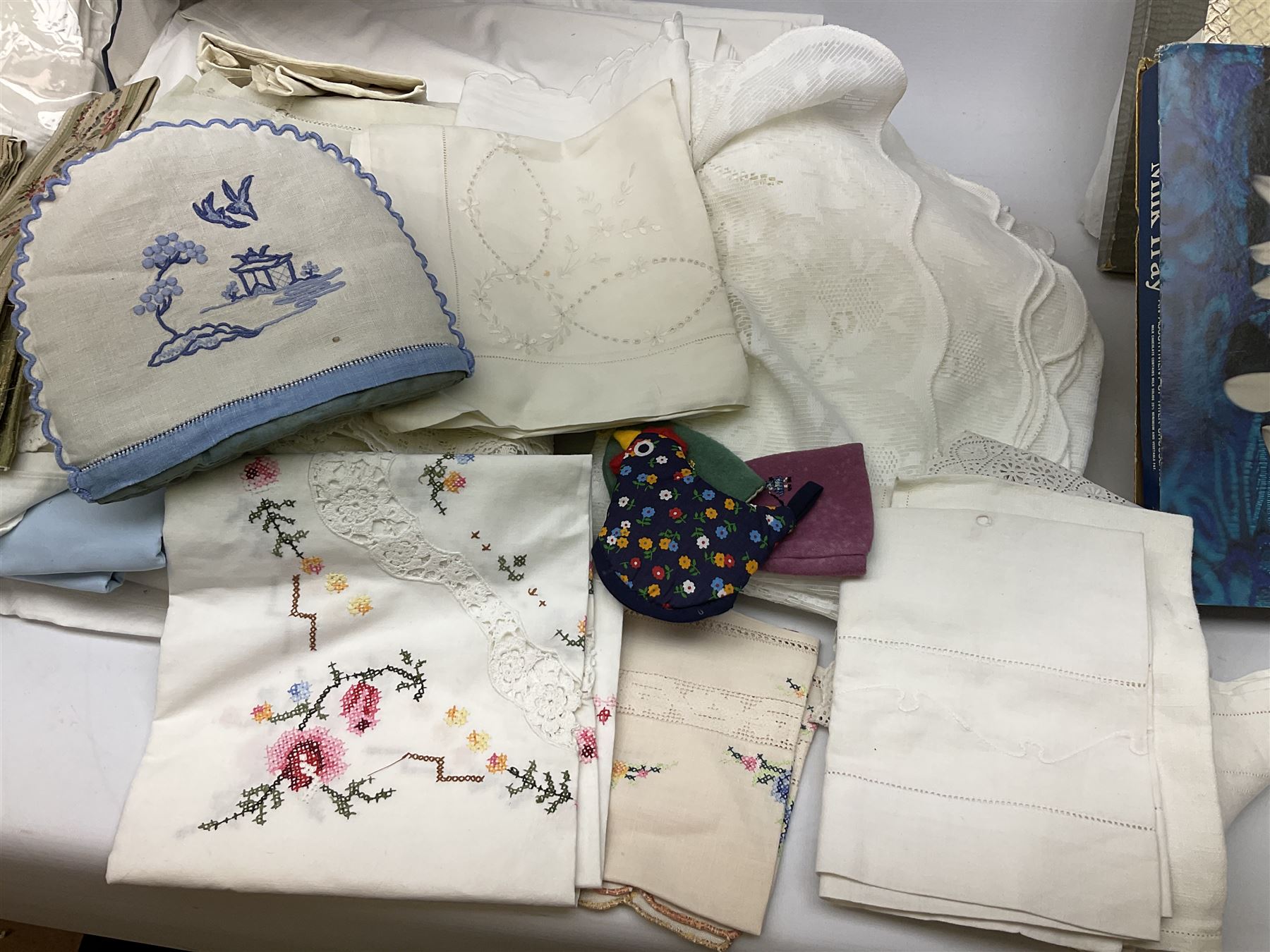 Large quantity of table linen and Victorian and later lace, framed machine tapestry depicting Greece, embroidered wall hanging decorated with a woodland scene with deer and blossoming tree, embroidered linen decorated with floral design, crochet, etc