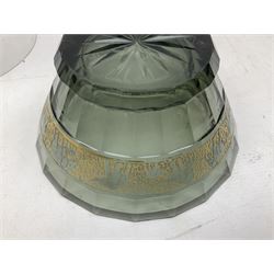 Clear glass display dome, dark glass bowl with elephant decoration banding and carved stone celtic cross