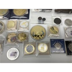 Mostly commemorative and fantasy coinage including commemorative crowns, 2018 'The Capsule Edition featuring the 2018 Paddington 50p coins' in display case, The Royal Mint Solomon Islands 2007 one ounce fine silver five dollars coin on card etc
