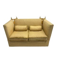 Edwardian knole design drop-arm two seat sofa, upholstered in yellow damask fabric with sprung back and seat and matching bolster cushions