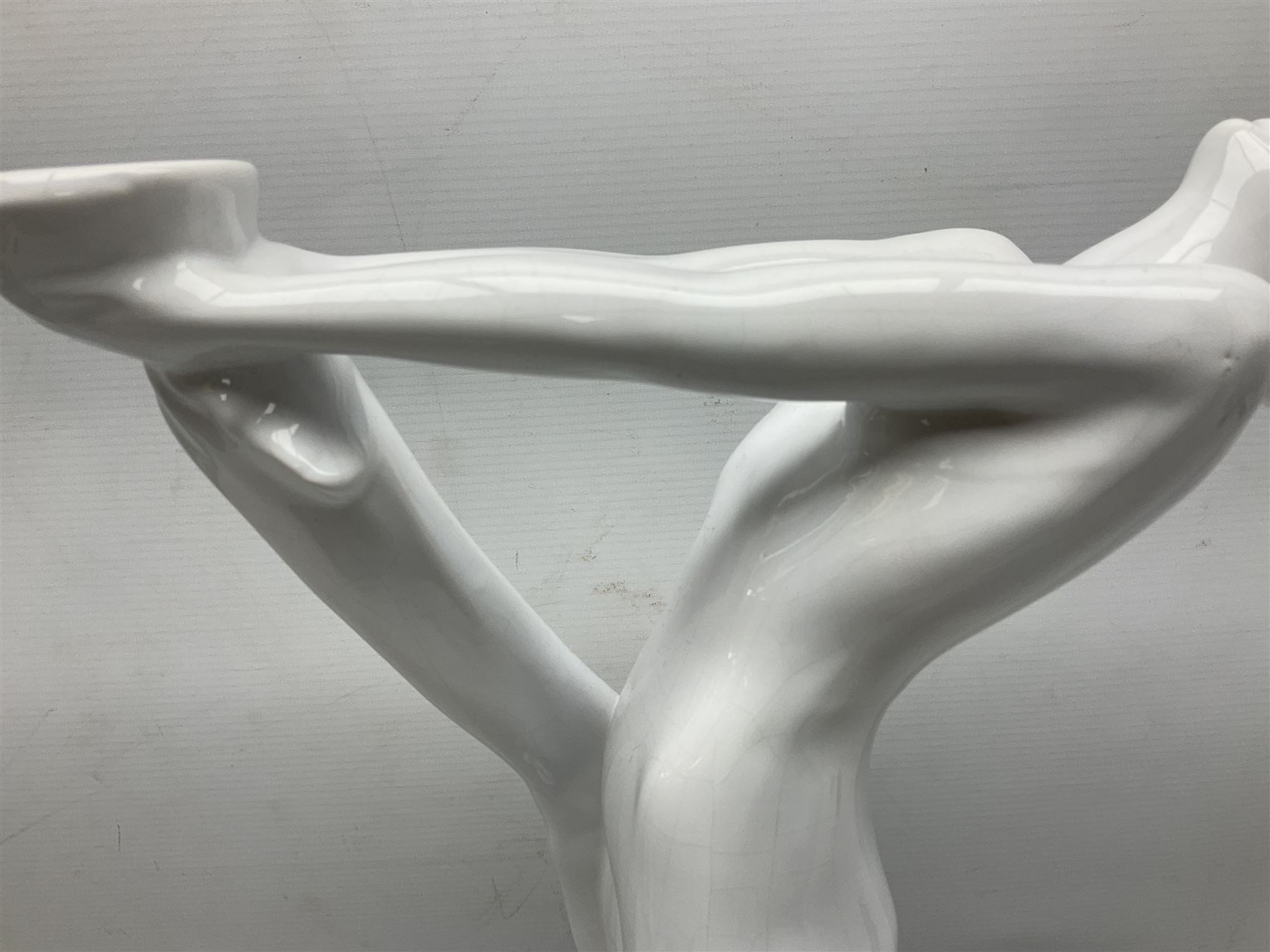 Art Deco style lamp modelled as a nude female dancer, with draped folds of linen, H46cm