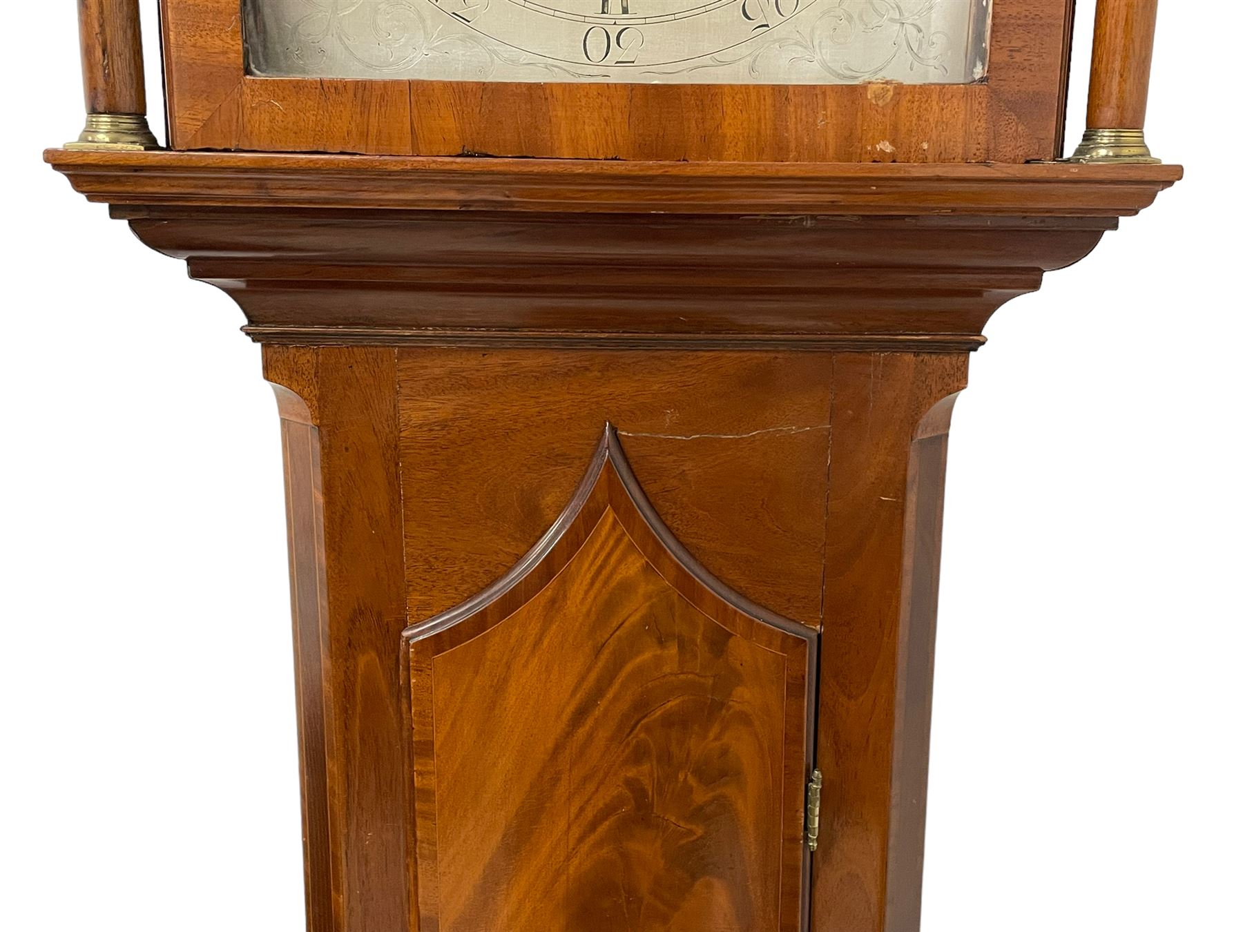 Robert Dalgliesh of Falkirk – Early 19th century 8-day mahogany longcase clock with a break arch pediment and conforming hood door, hood with flanking turned pilasters and brass capitals, trunk with canted corners and spire topped door, on a rectangular plinth with applied shaped skirting, silvered sheet break arch dial with engraving to the spandrels and arch, Roman numerals, five minute Arabic’s and matching steel hands, calendar aperture and seconds dial, with a recoil anchor escapement, rack striking movement, striking the hours on a Bell. With weights and pendulum.