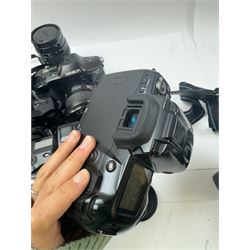 Six Minolta Dynax SLR camera bodies, comprising 800si serial no. 62703606, three 7xi examples, including one boxed example, serial nos. 20106944, 16123311 & 22107553, and two 9xi examples, serial no. 18209901 & 18202113, with three Minolta lenses, including Zoom xi 28-105mm 1:3.5(22)-4.5 lens, AF Zoom 28-85mm 1:3.5 (22)-4.5 lens and an AF Zoom 75-300mm 1:4.5(32)-5.6 lens, Hama carry case and other accessories