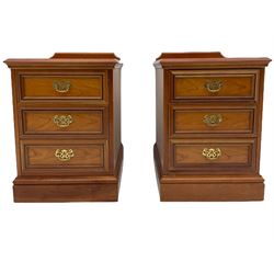 Pair of cherry wood three drawer bedside chests
