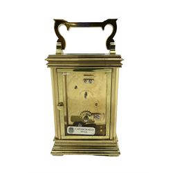English - late 20th century 8-day carriage clock by Taylor & Bligh, in an Anglaise case with a rectangular handle, bevelled glass panels and enamel dial with Roman numerals, minute markers and steel moon hands, timepiece spring driven movement with a jewelled lever platform escapement. With key.