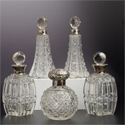 Late Victorian glass globe scent bottle with embossed silver cover, pair of square glass s...
