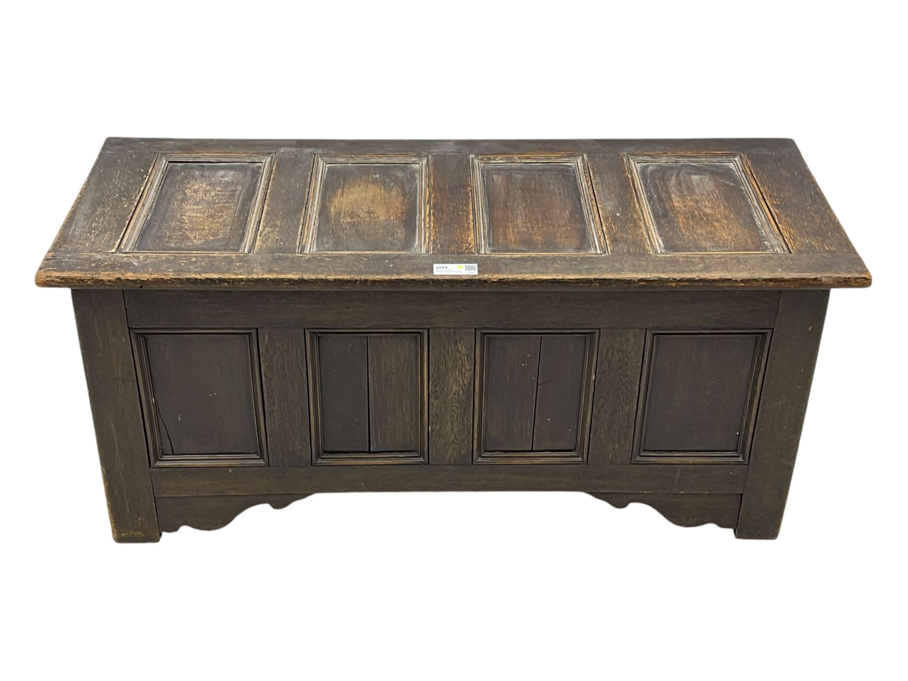 18th century design oak coffer, four panel hinged lid over four panel front, panelled sides, on stile supports with shaped brackets 