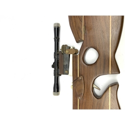 20th century crossbow with sectional mahogany shaped stock and Nikko Stirling telescopic sight L89cm; together with another similar with hinged foresight; and six arrows (8)